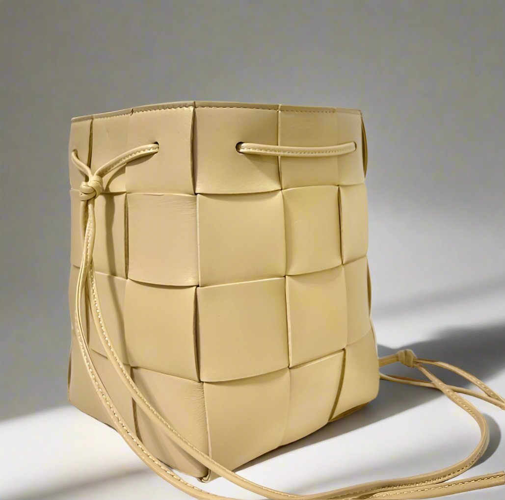 Bottega Veneta - Small Leather Cassette Bucket Bag in Beige - WOMEN