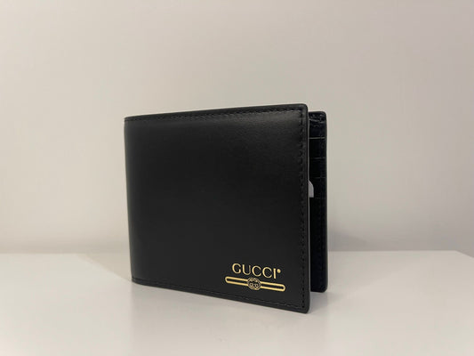 Gucci - Gucci Black Leather Gold Embossed GG Logo Bifold Wallet - MEN